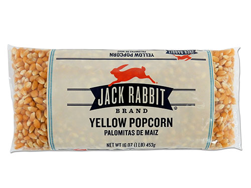 16 ounce bag of Jack Rabbit Brand Yellow Popcorn. Clear bag with tan background and Jack Rabbit Logo.