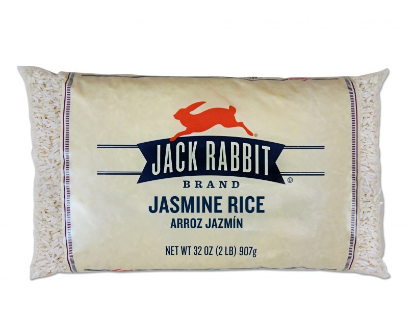 32 ounce bag of Jack Rabbit Brand Jasmine Rice. Clear bag with tan background and Jack Rabbit Logo.